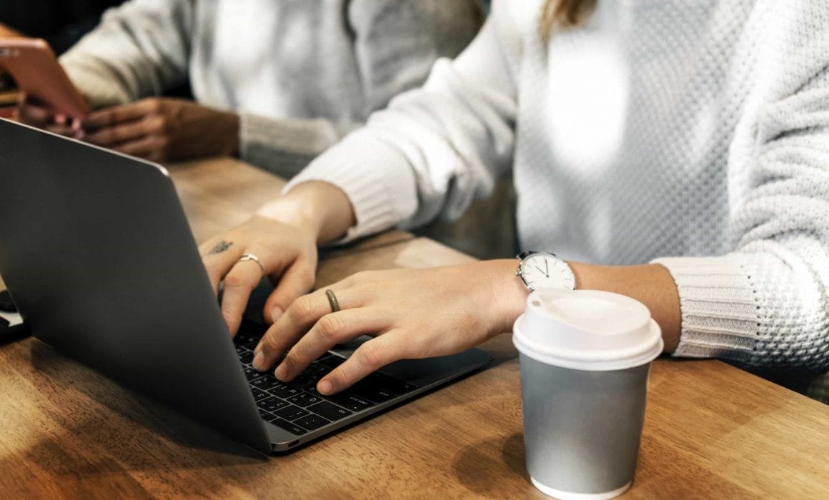 Drinking coffee and working at HK Works